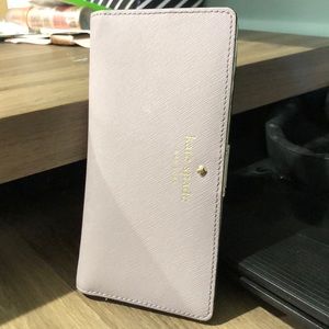 Authentic, barely used, purple Kate Spade wallet